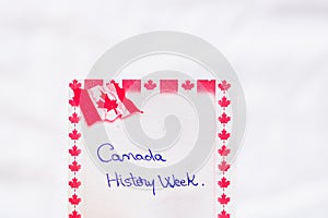 Canada History week handwriting on paper with Canada flag. Writing text on memo post reminder. Bucharest, Romania, 2020