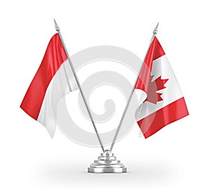 Canada and Indonesia table flags isolated on white 3D rendering