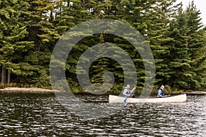 Canada Ontario Lake of two rivers Couple on a Canoe Canoes on the water Algonquin National Park