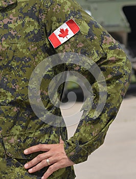 Canada patch flag on soldiers arm