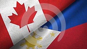 Canada and Philippines two flags textile cloth, fabric texture