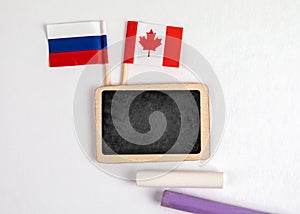 Canada and Russia flags