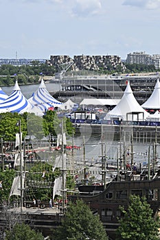 Canada\'s Old Port Montreal River view boat tourists in summer photo