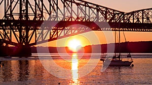 Sunset Reflection Under the Bridge of Quebec