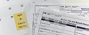 Canada Tax forms with Calendar showing Canada Tax day - April 30 photo