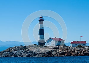 Canada, Vancouver Island, Pacific, lighthouse, sea-lions on rocks, island,