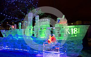 Canadian battleship ice sculpture illuminated at night photo