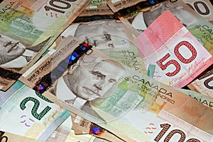 Canadian Bills ($20, $50, $100) photo