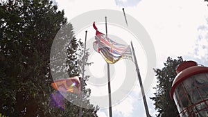 Canadian, British Columbia, and First Nations flag flying in Sooke on Canada Day. 4K 24FPS.