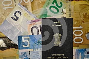 Canadian currency of denomination 5, 10, 20, 100 with Indian Passport