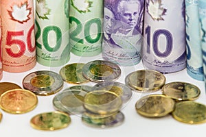 Canadian dollar bills and coins on a table, Canadian currency