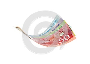 Canadian dollar bills presented as flying in the air