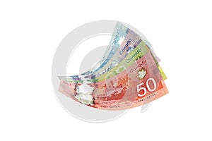 Canadian dollar bills presented as flying in the air, photo
