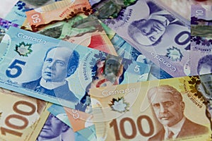 Canadian dollar bills on a table, Canadian currency