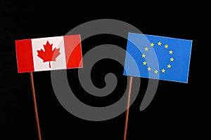 Canadian flag with European Union EU flag on black