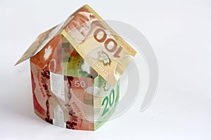 Canadian money house  on white