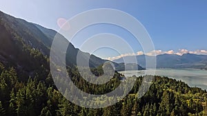 Canadian Mountain Landscape and Vibrant green trees. Fall Season. Aerial Nature Background