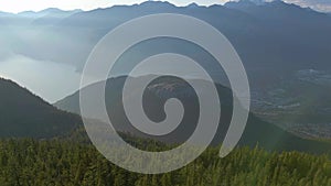 Canadian Mountain Landscape and Vibrant green trees. Fall Season. Aerial Nature Background