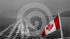 Canadian National Flag on the stern of the Ferry on route from Port Hardy to Prince Rupert