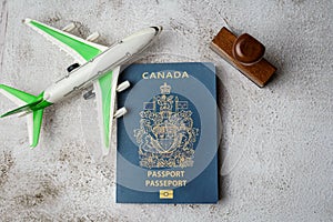 Canadian passport stamp and airline. Holiday and business travel concept