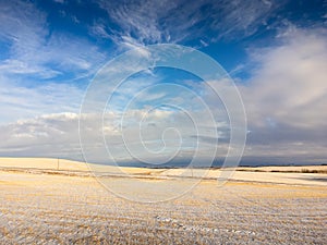 Canadian prairies scene with golden crop stubble