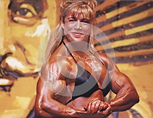 Laura Binetti Flexes at Ms Olympia Contest in New York City in 1997