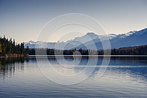 Canadian rockies with autumn forest and clear sky on Pyramid lake in Jasper national park