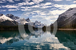Canadian rockies with blue sky reflection on Maligne lake in Jasper national park