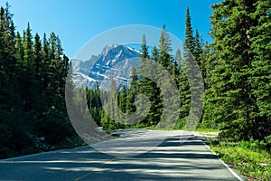 Canadian Rockies rural road landscape. Jasper National Park beautiful nature scenery. Alberta, Canada.