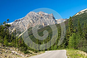 Canadian Rockies rural road landscape. Jasper National Park beautiful nature scenery. Alberta, Canada.