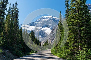 Canadian Rockies rural road landscape. Jasper National Park beautiful nature scenery. Alberta, Canada.