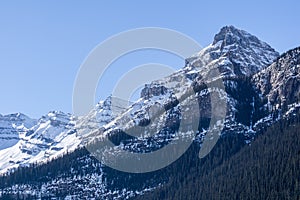 Canadian Rockies with snow in Alberta Canada early spring clear sky