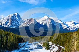 Canadian Rockies in the Winter at Morant\'s Curve in Banff National Park photo