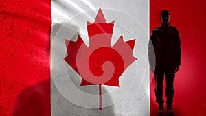 Canadian soldier silhouette standing against national flag, proud army sergeant