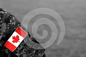 Canadian troops. Canadian Army. Canada flags on soldiers arm.