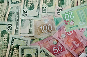 Canadian and USA currency dollars of denomination 20,50 and 100