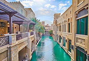 The canal amid the buildings of Souk Madinat Jumeirah market, Dubai, UAE