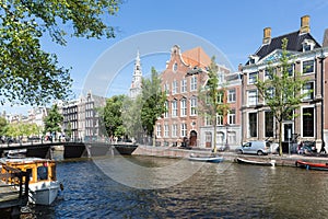 Canal in Amsterdam with historic mansions