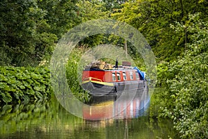 Canal boat in the Kennet and Avon canal, Wiltshire, UK.