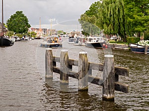 Canal with boats in old town of Lemmer, Friesland, Netherlands