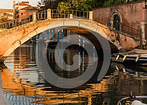 Canal and bridge reflection the water canal in Venice, Italy