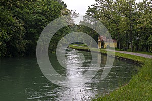Canal called Naviglio Martesana near the town of Canonica d`Adda in north Italy.