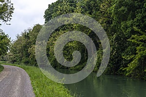 Canal called Naviglio Martesana near the town of Canonica d`Adda in north Italy.