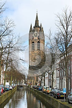 Canal and church tower in Delft,