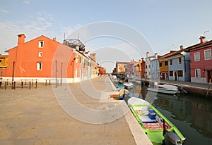 canal and the colorful houses of the BURANO island near Venice i