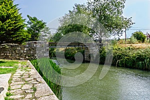 canal de castilla used to irrigate the harvest fields, Palencia, Spain photo