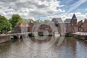 The canal Eem with in the background the medieval gate The Koppelpoort in the city of Amersfoort in The Netherlands