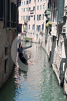 Canal and gondolas in Venice