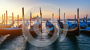 Canal with gondolas in Venice, Italy. Architecture and landmarks