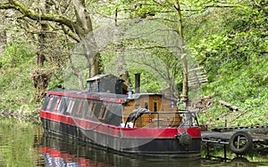 Canal house boat on waterway in Yorkshire photo